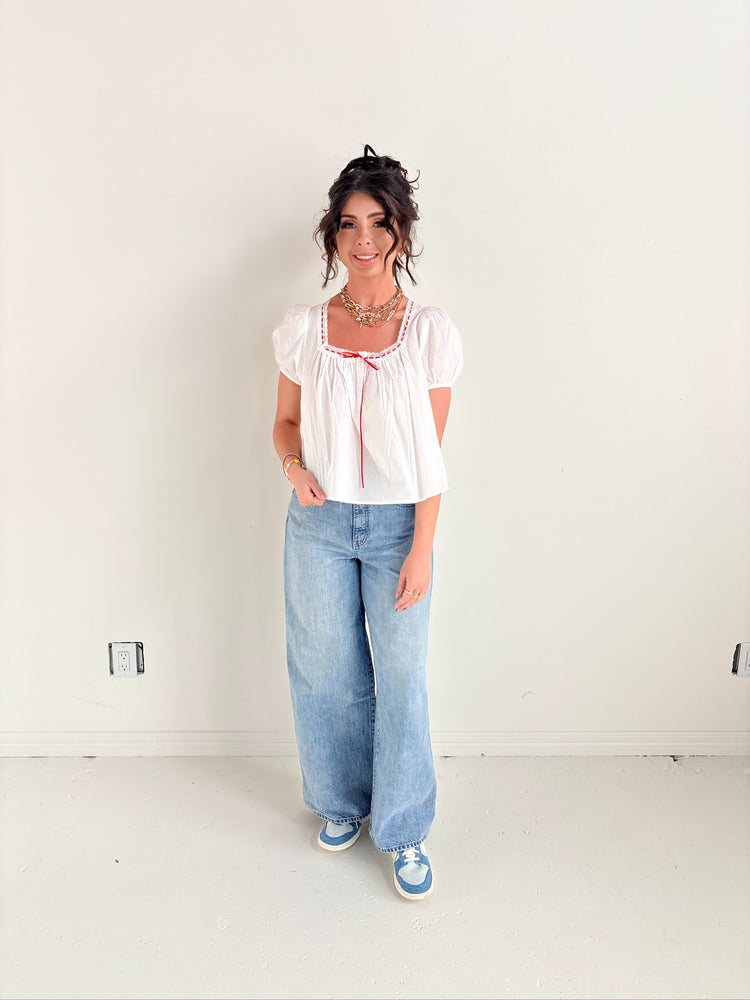WHITE TOP RED RIBBON DETAILS-11