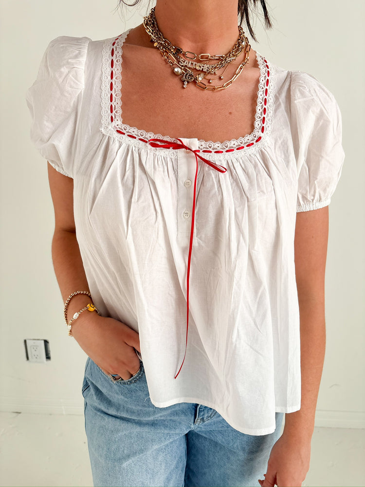 WHITE TOP RED RIBBON DETAILS-11
